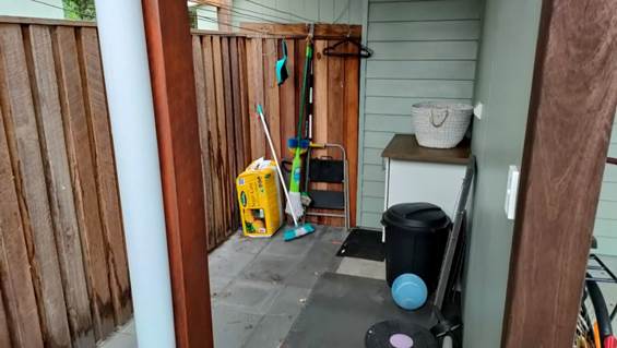 A picture containing toilet, porch, trash

Description automatically generated