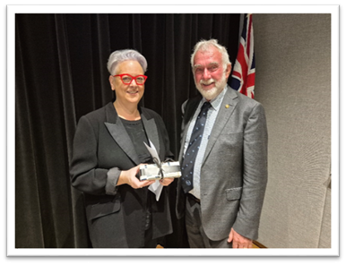 Mayor Russell Webb presents a thank you gift to Hon Penny Sharpe MLC